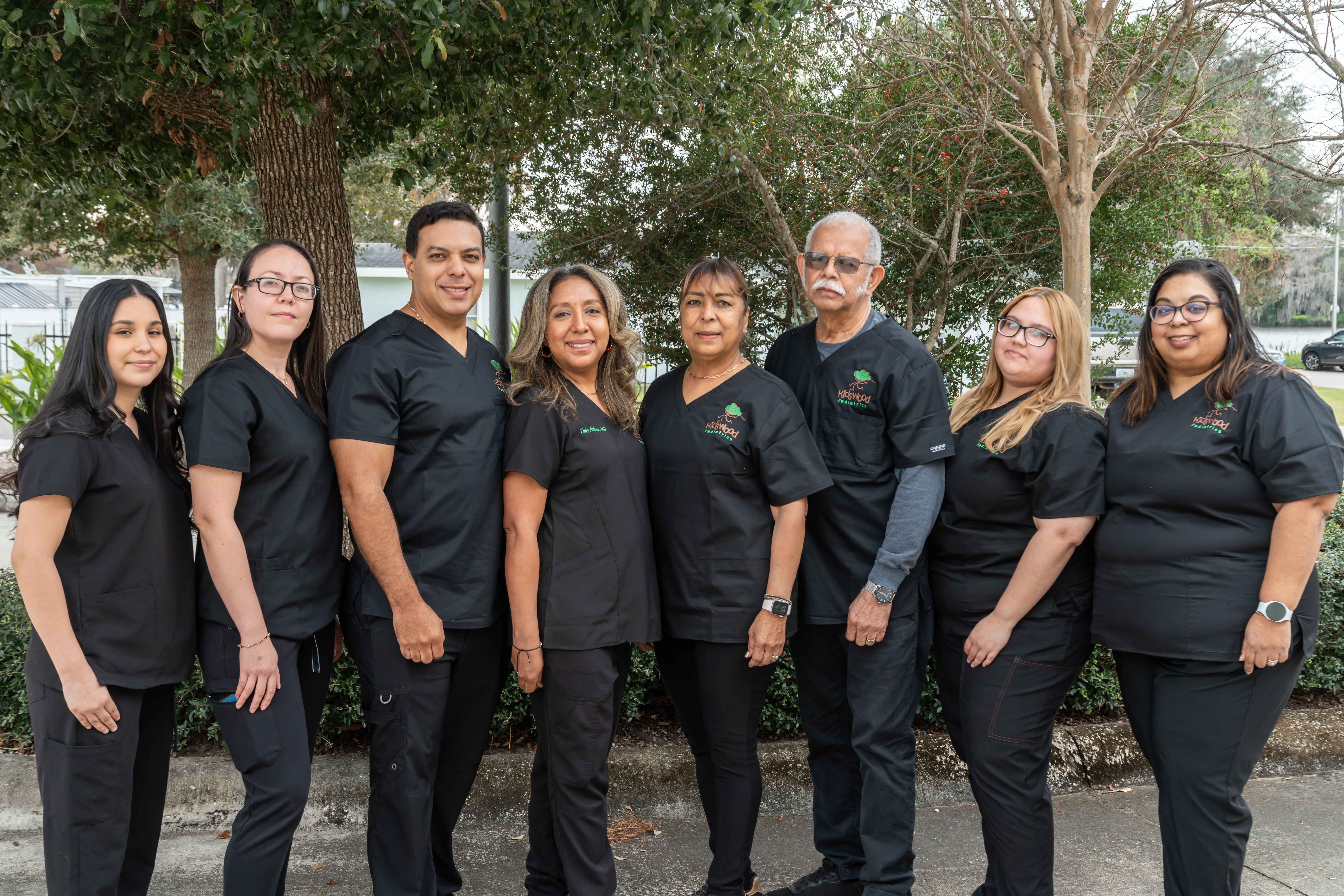 A group photo of the staff outside of Kidswood Pediatrics
