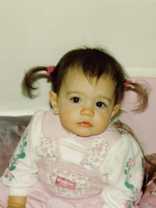 Ariel Axsom as a child