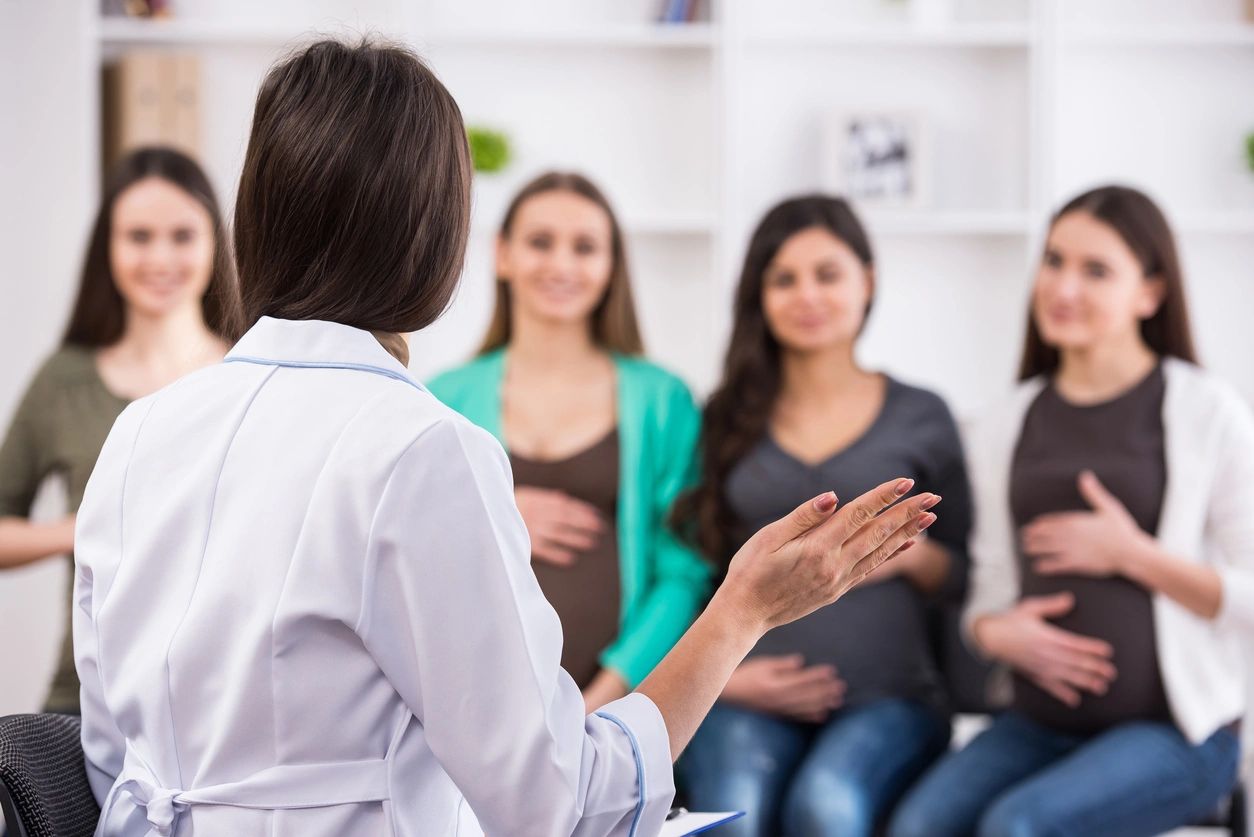 A physician leading a class