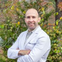 Dr. Nicholas Fiacco in front of a tree